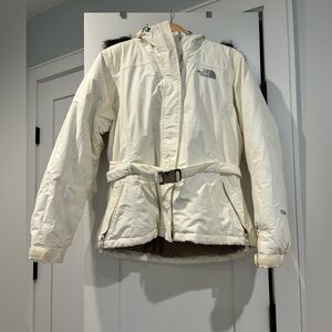 White woman’s Northface down jacket with buckle and fur size large